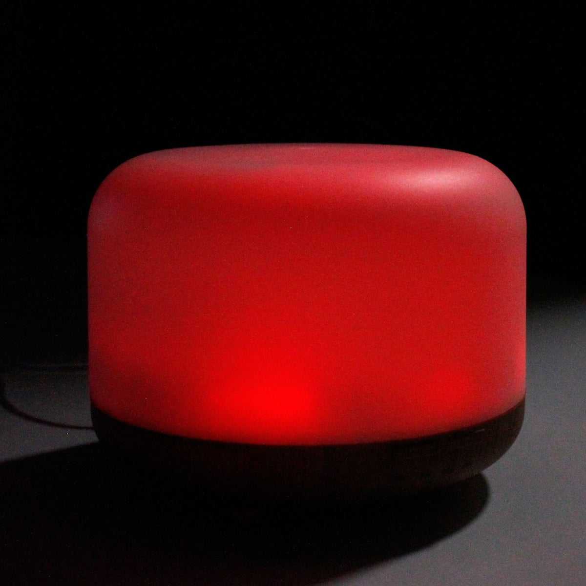 Squat white pod aroma diffuser on a wood-effect base - view 5