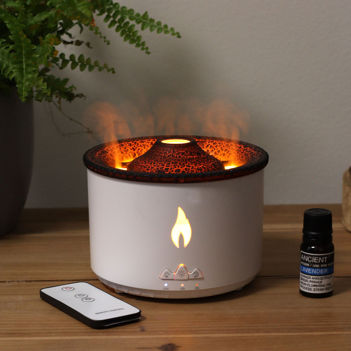 White volcano flame aroma diffuser with a textured dark lid, on cotton canvas - view 10