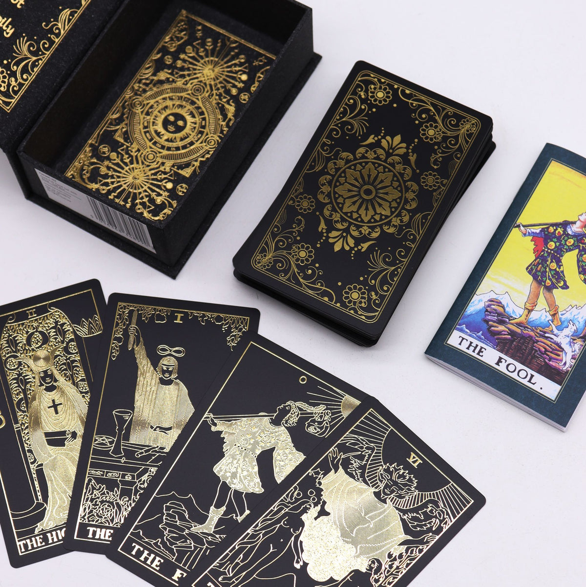 Gold foil tarot card set with guidebook and black and gold gift box
