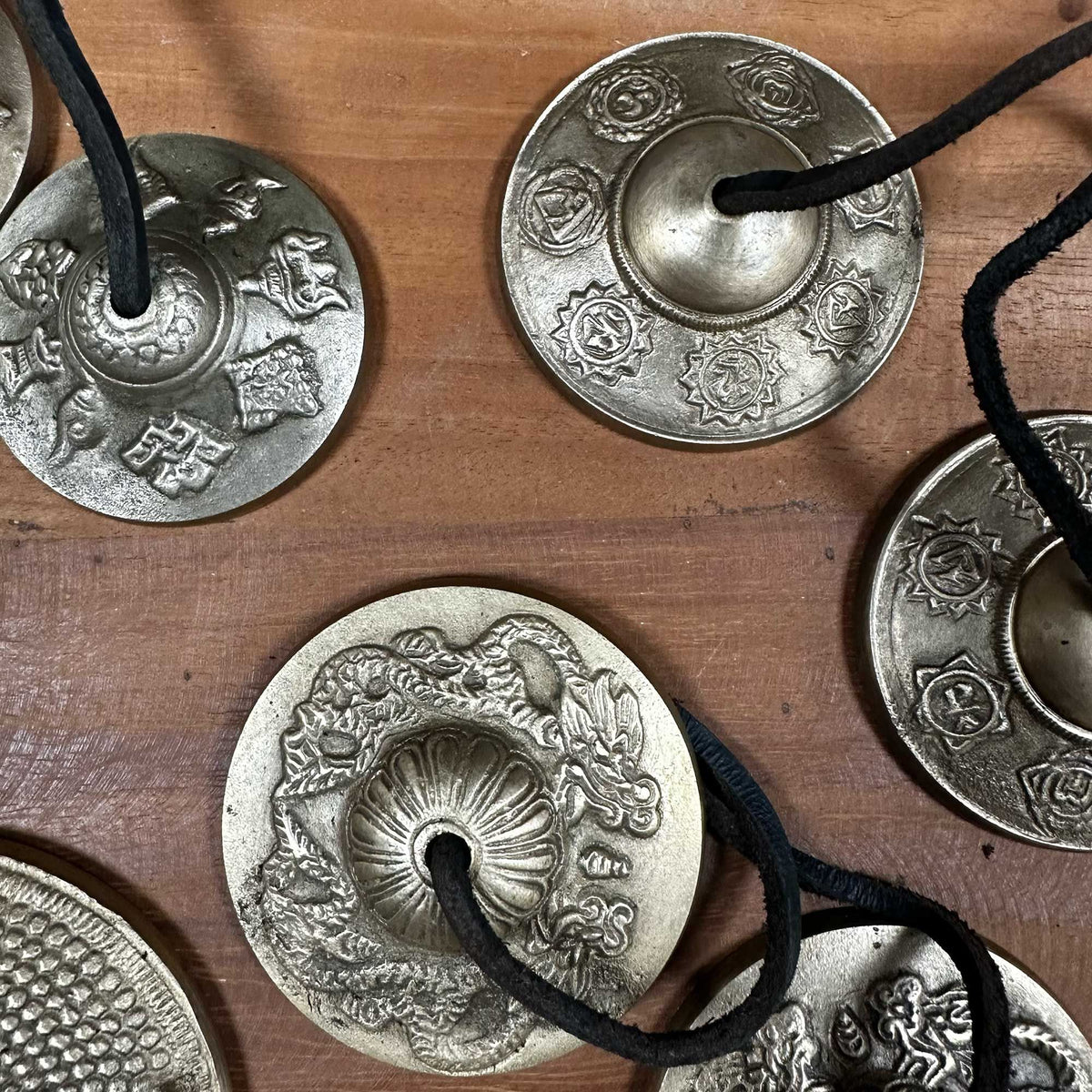 Pair of brass Tibetan tingsha bells cast with Five Buddha figures - view 3