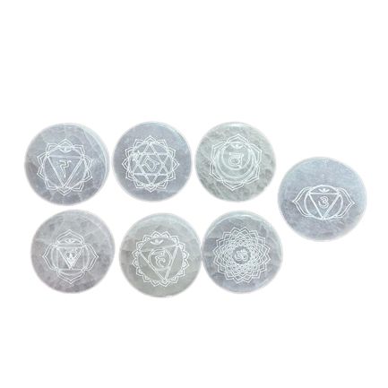 Set of seven small selenite charging plates, one engraved and coloured per chakra - view 2