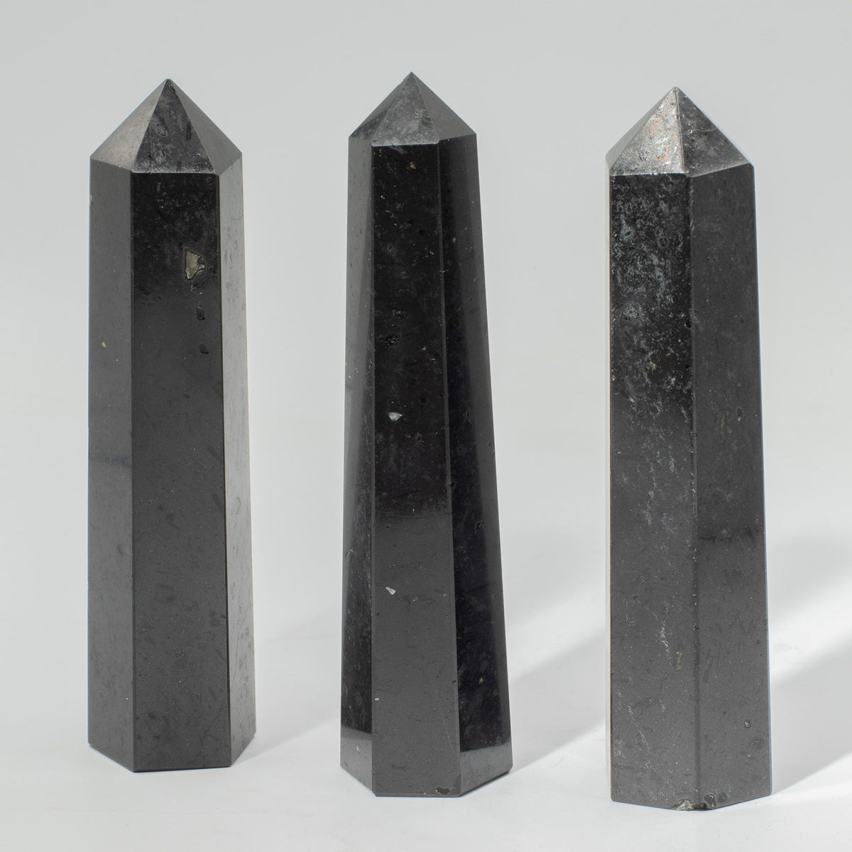 Large black tourmaline six face obelisk point with a mirror polish - view 5