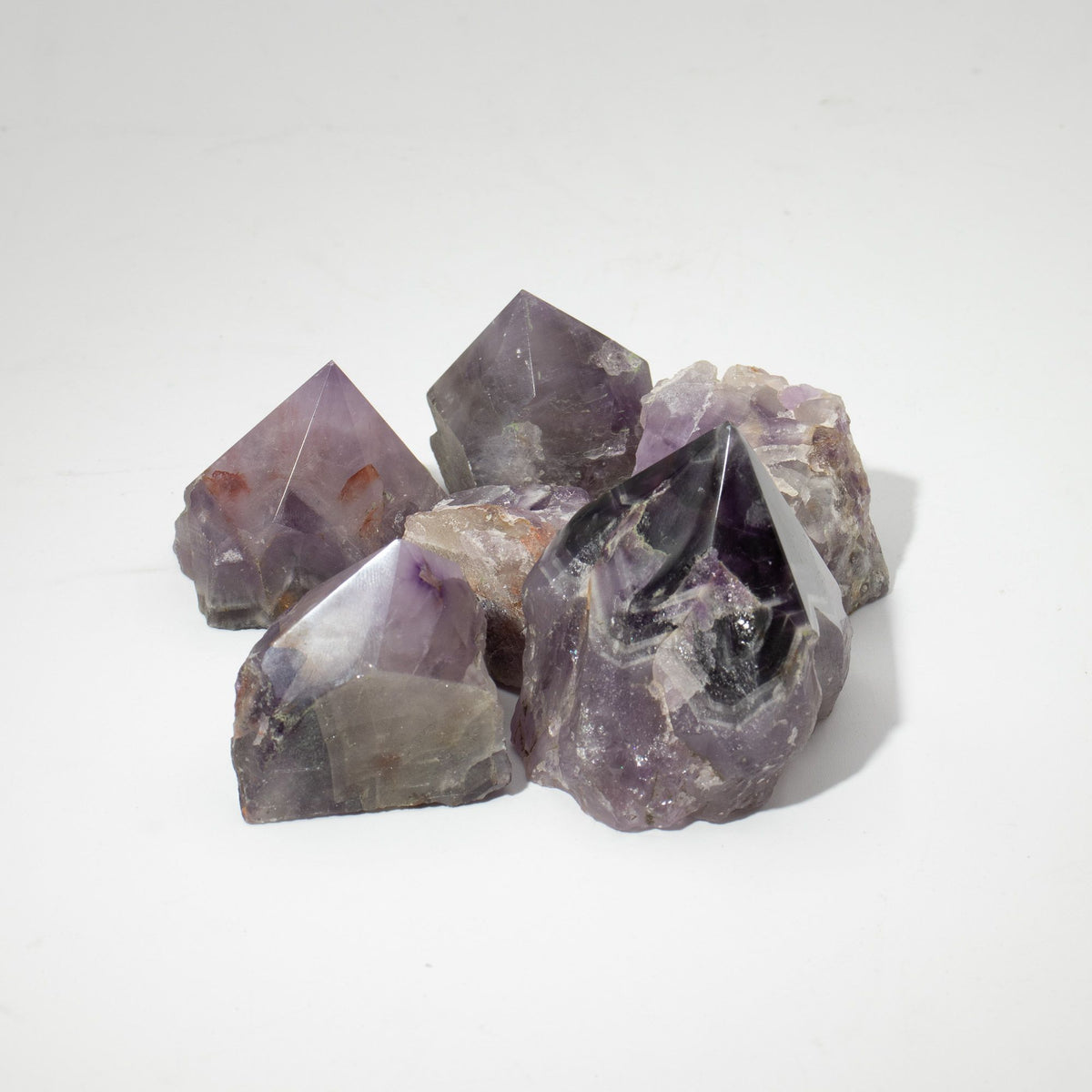Group of A grade amethyst standing points, polished on top and raw at the sides - view 6