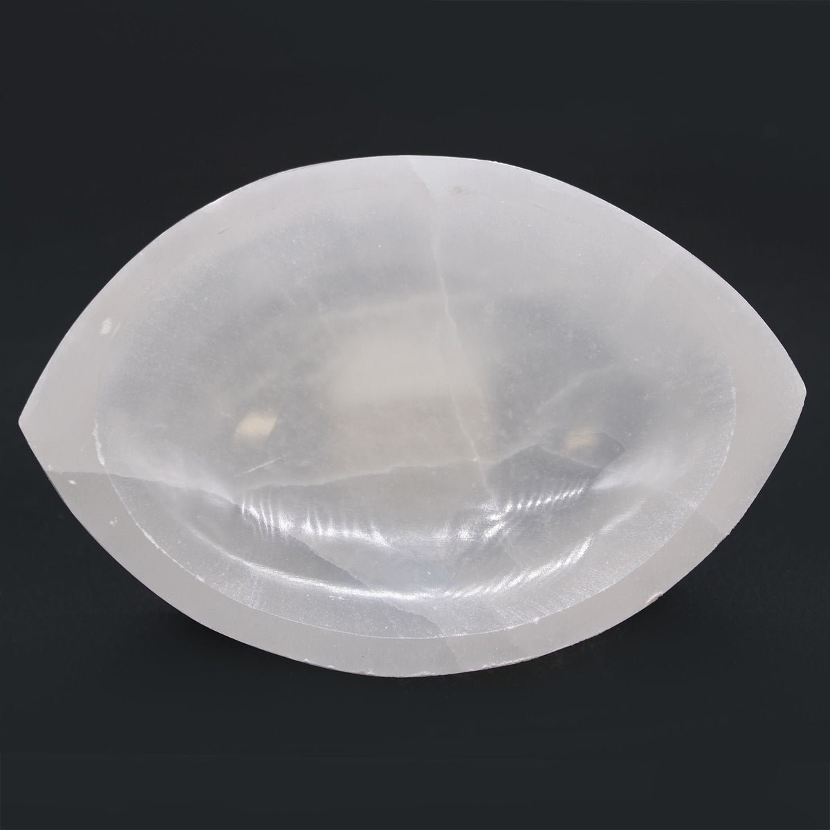 Pointed oval selenite bowl, polished inside with a raw white rim - view 4