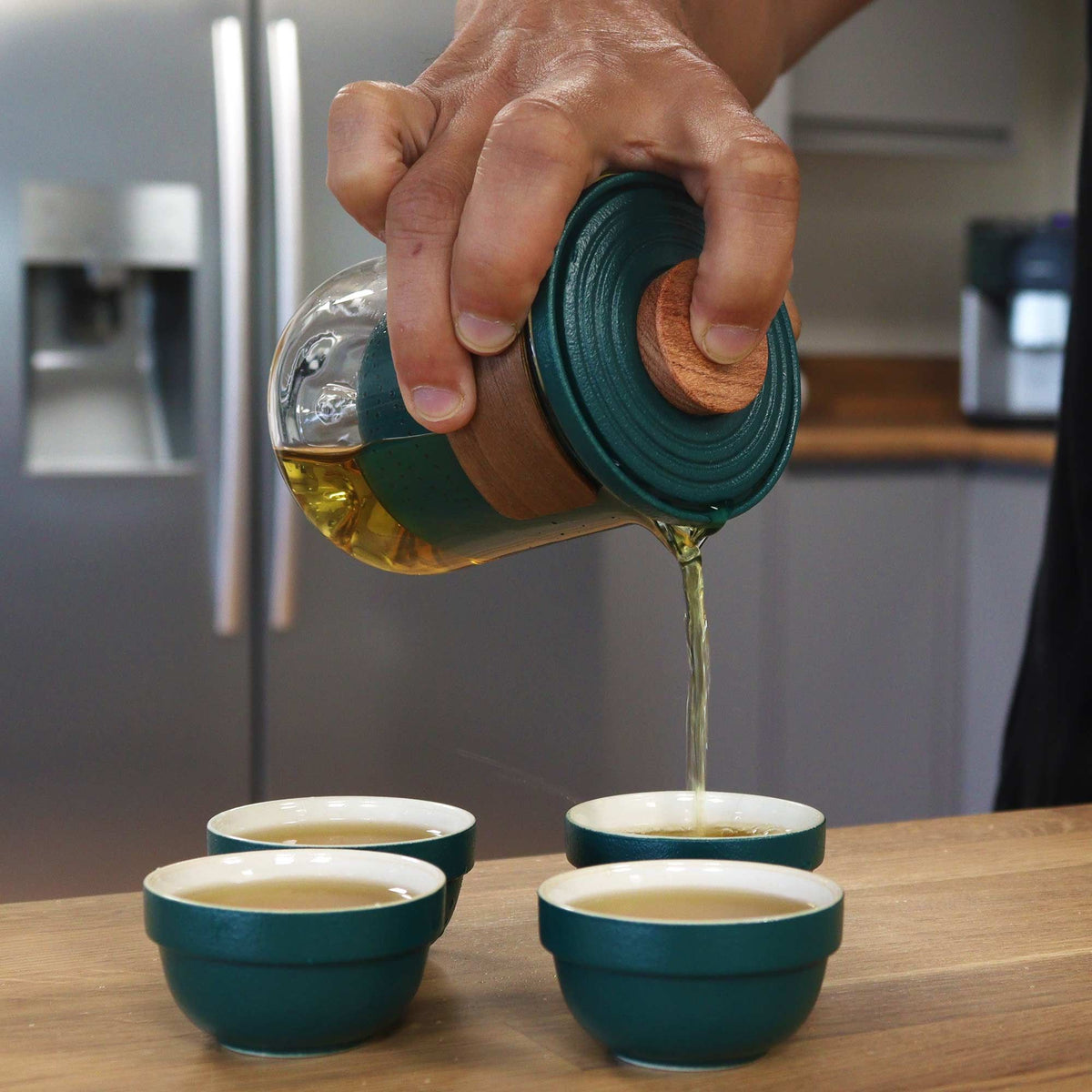 Teal and glass travel tea set with teapot, infuser and four stacking cups - view 6