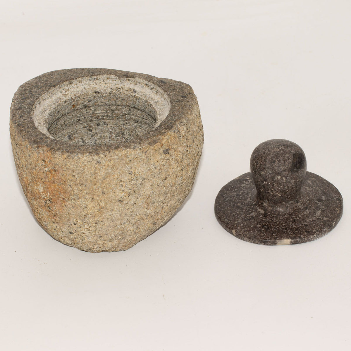 Medium grounding pot carved from a single riverstone, with a fitted stone lid, rough outside and smooth within - view 6