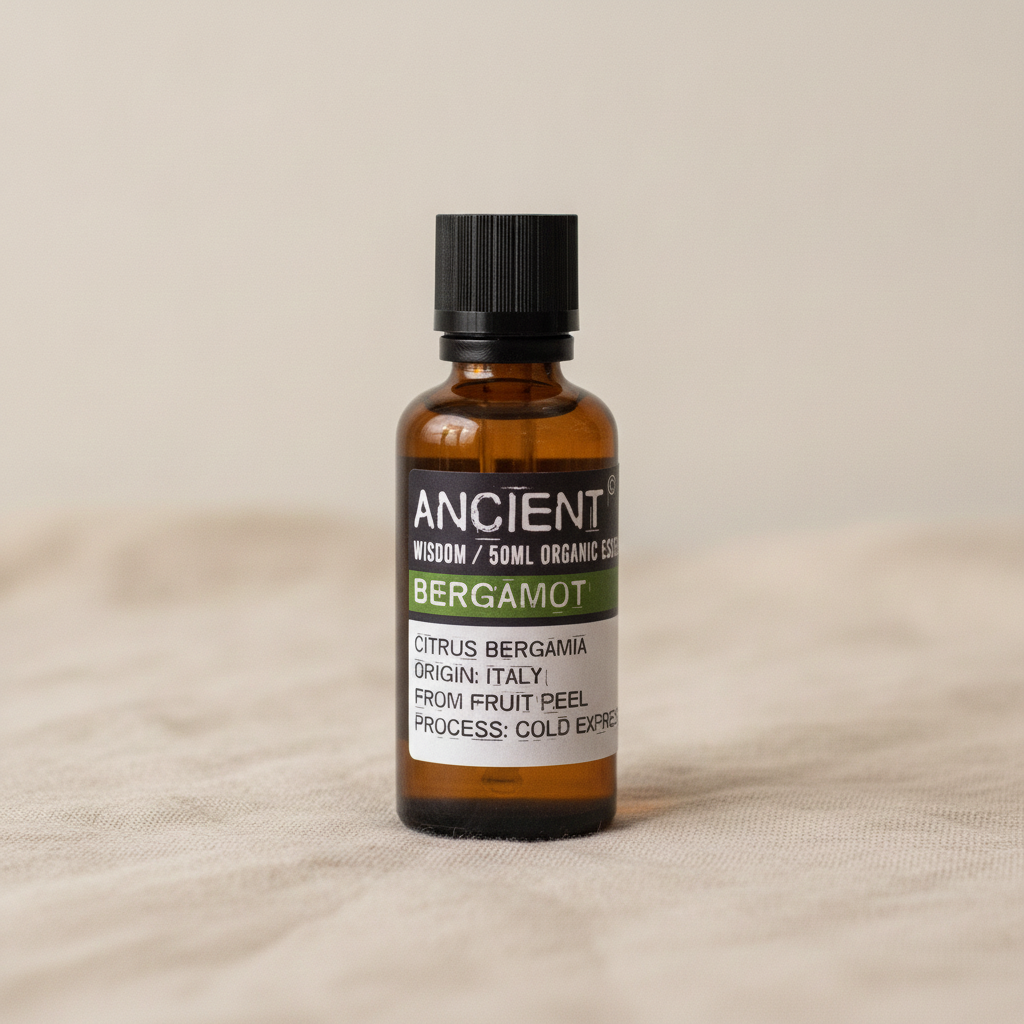 Bergamot organic essential oil 50ml amber bottle on natural linen