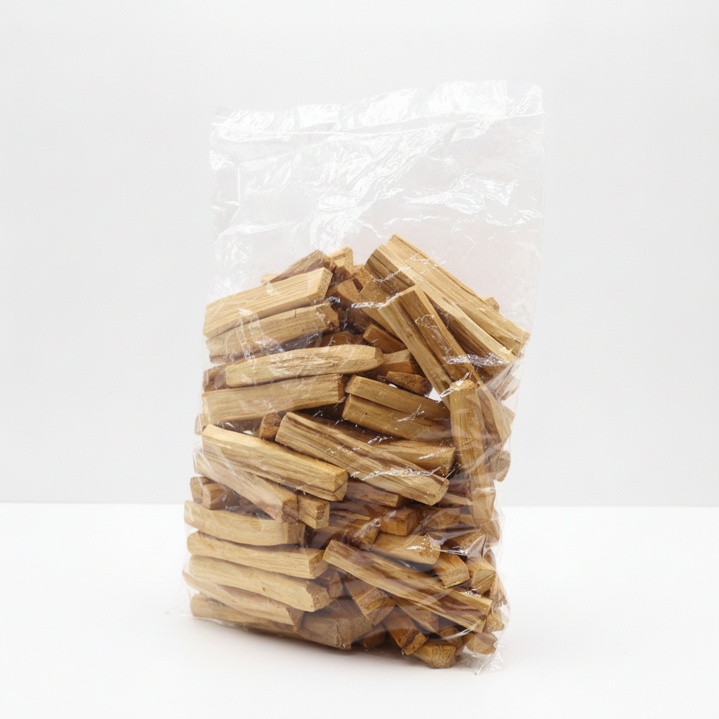 First grade palo santo wood sticks on a clean white surface against a white wall