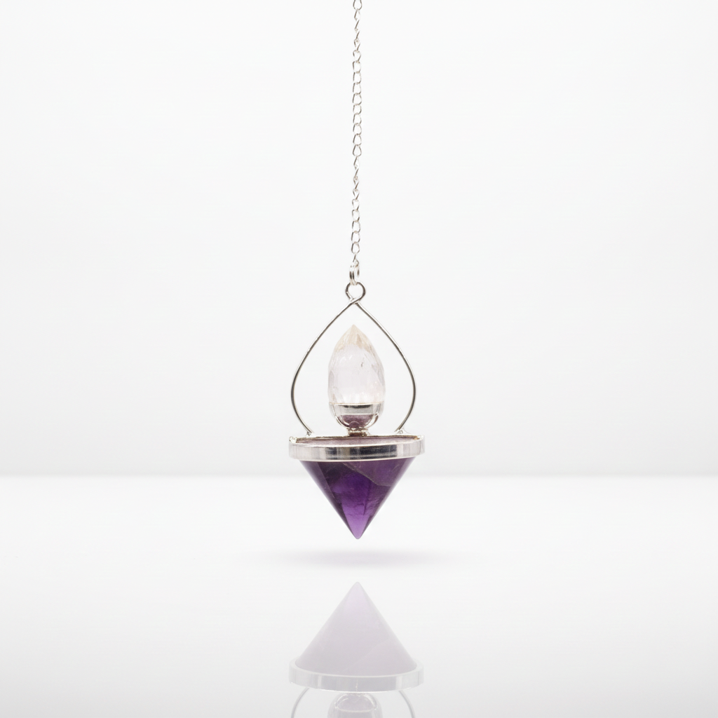Amethyst and rock quartz lantern of life pendulum on a clean white surface against a white wall