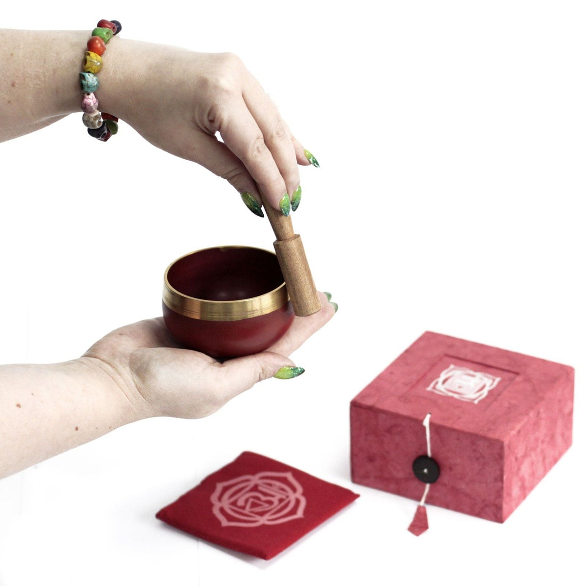Red chakra singing bowl with its striker, cushion and box, on cotton-rag paper - view 4