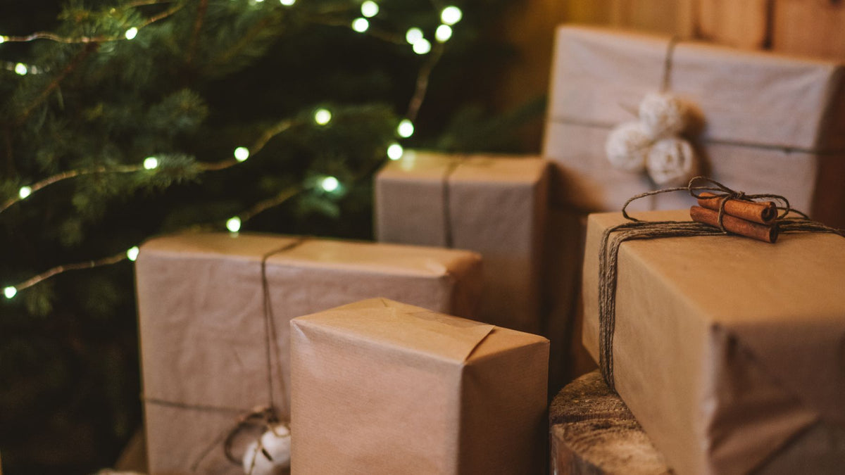 Parcels wrapped in kraft paper beneath soft lights