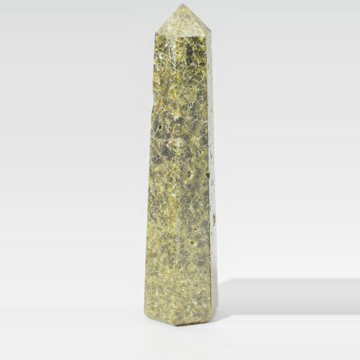 Epidote Crystal Obelisk Point - Six Face Polished Gemstone Tower, pictured on its own