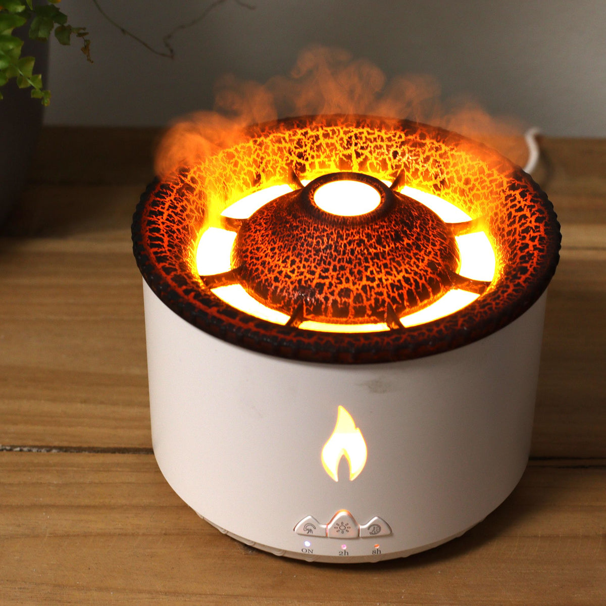 White volcano flame aroma diffuser with a textured dark lid, on cotton canvas - view 8