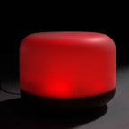 Squat white pod aroma diffuser on a wood-effect base - view 5