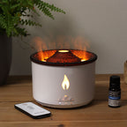 White volcano flame aroma diffuser with a textured dark lid, on cotton canvas - view 10