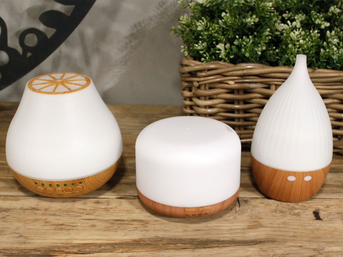 Squat white pod aroma diffuser on a wood-effect base - view 6