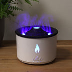 White volcano flame aroma diffuser with a textured dark lid, on cotton canvas - view 3