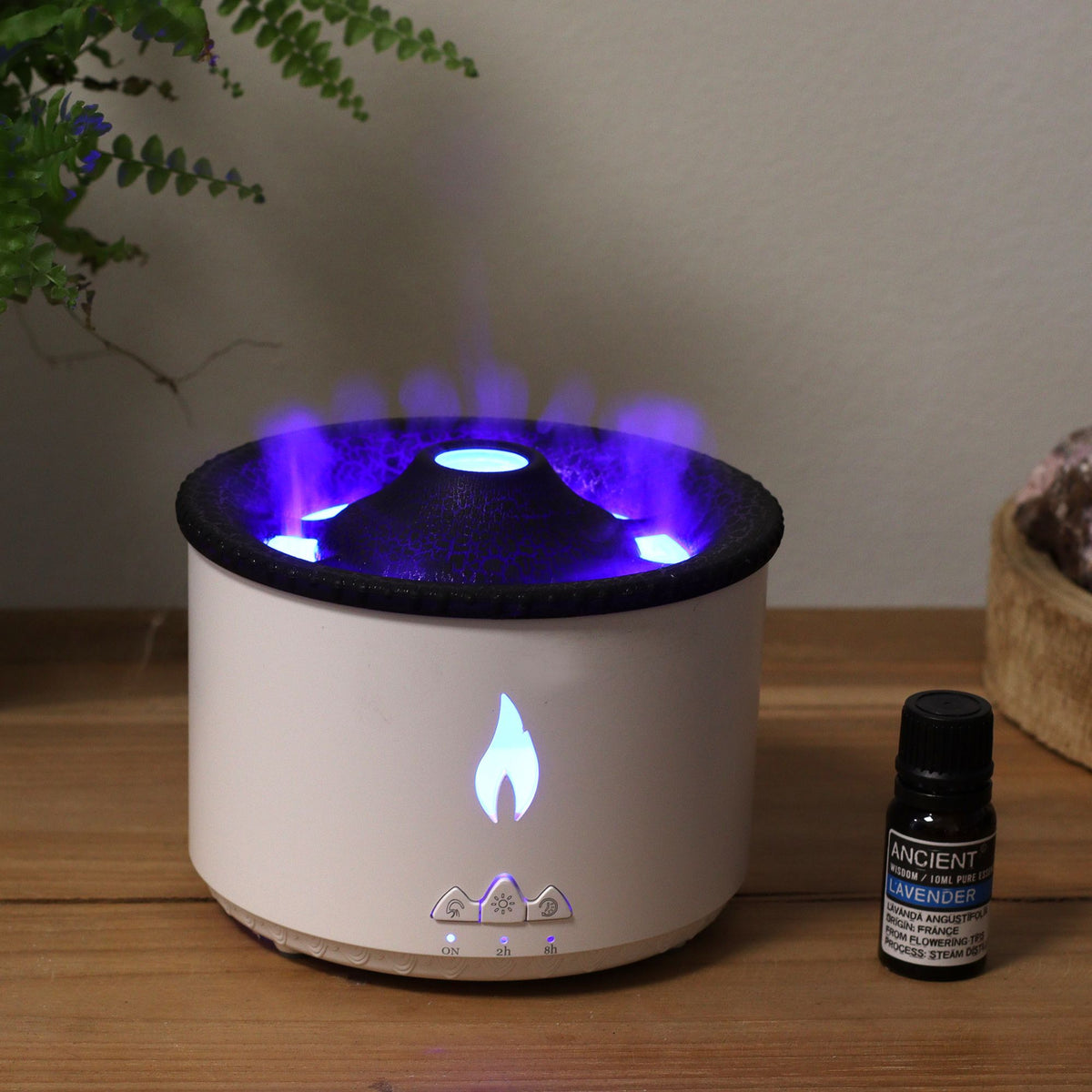 White volcano flame aroma diffuser with a textured dark lid, on cotton canvas - view 9