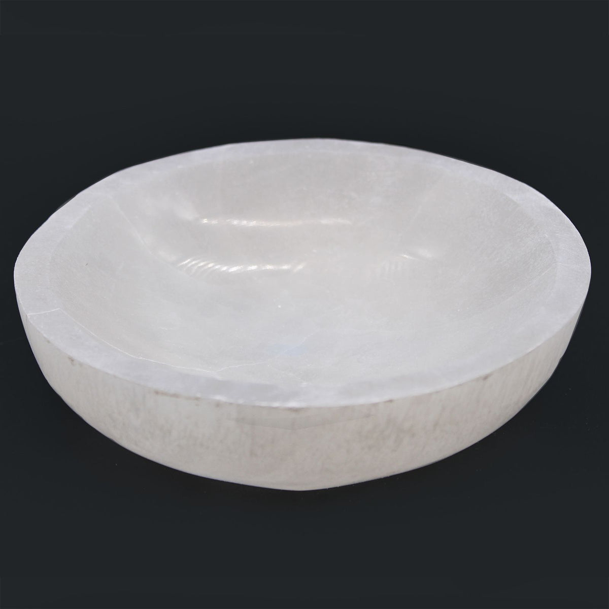 Round selenite bowl, polished inside with a raw white outer wall - view 5