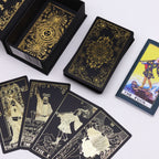 Gold foil tarot card set with guidebook and black and gold gift box