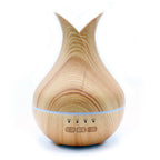 Light wood-effect aroma diffuser shaped like an open tulip