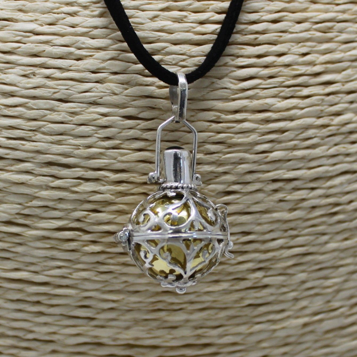 Silver angel bell pendant in the Night-time design on a neck cord - view 2