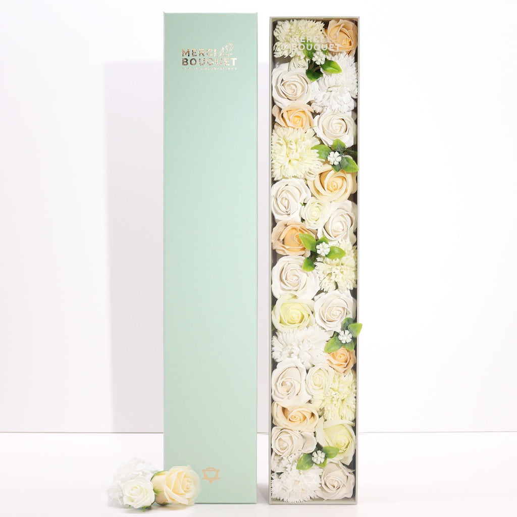 Long box of white and ivory soap roses lying open on cotton canvas - view 3