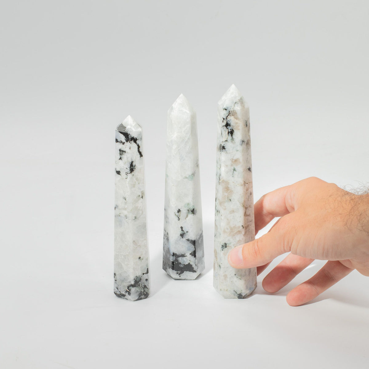 Large rainbow moonstone six face obelisk point, milky white with blue flash