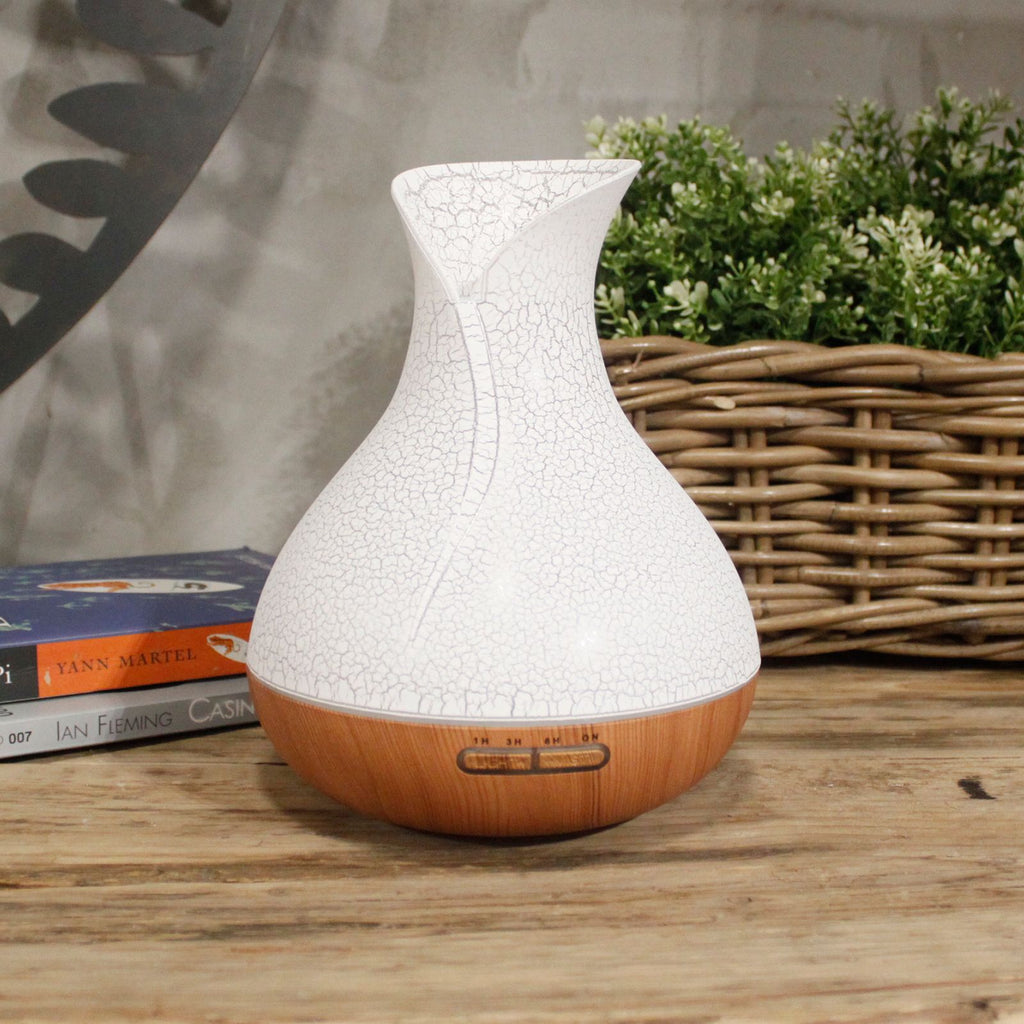 White crackle-glaze vase-shaped aroma diffuser on a wood base - view 2