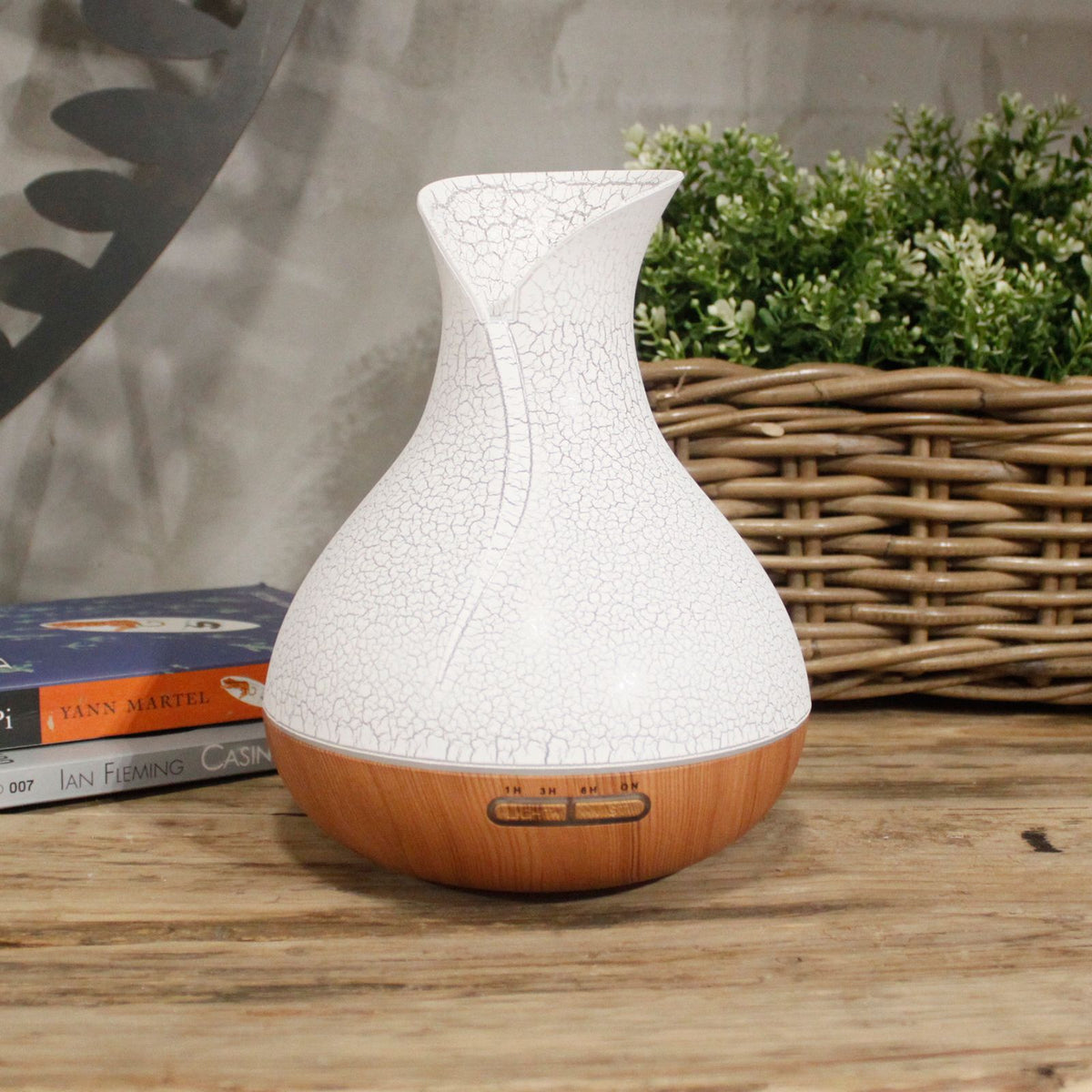 White crackle-glaze vase-shaped aroma diffuser on a wood base - view 2
