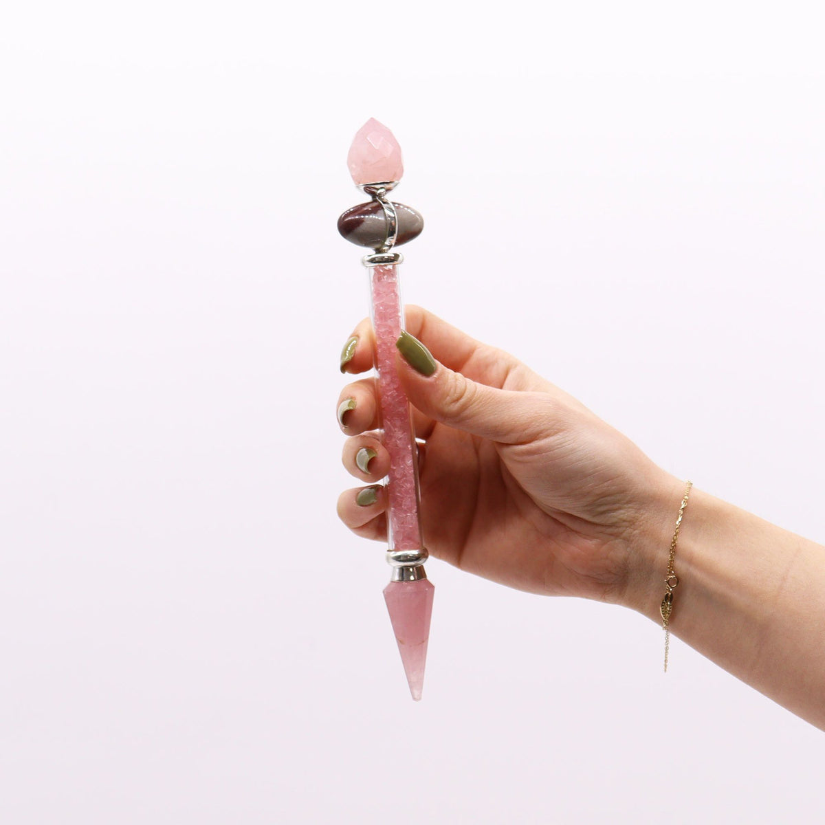 Rose quartz shiva lingam crystal wand with a faceted point - view 3