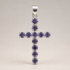 Silver-plated crucifix pendant set with deep purple stones, on linen - view 3