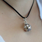 Silver angel bell pendant in the Dreams design on a neck cord - view 3