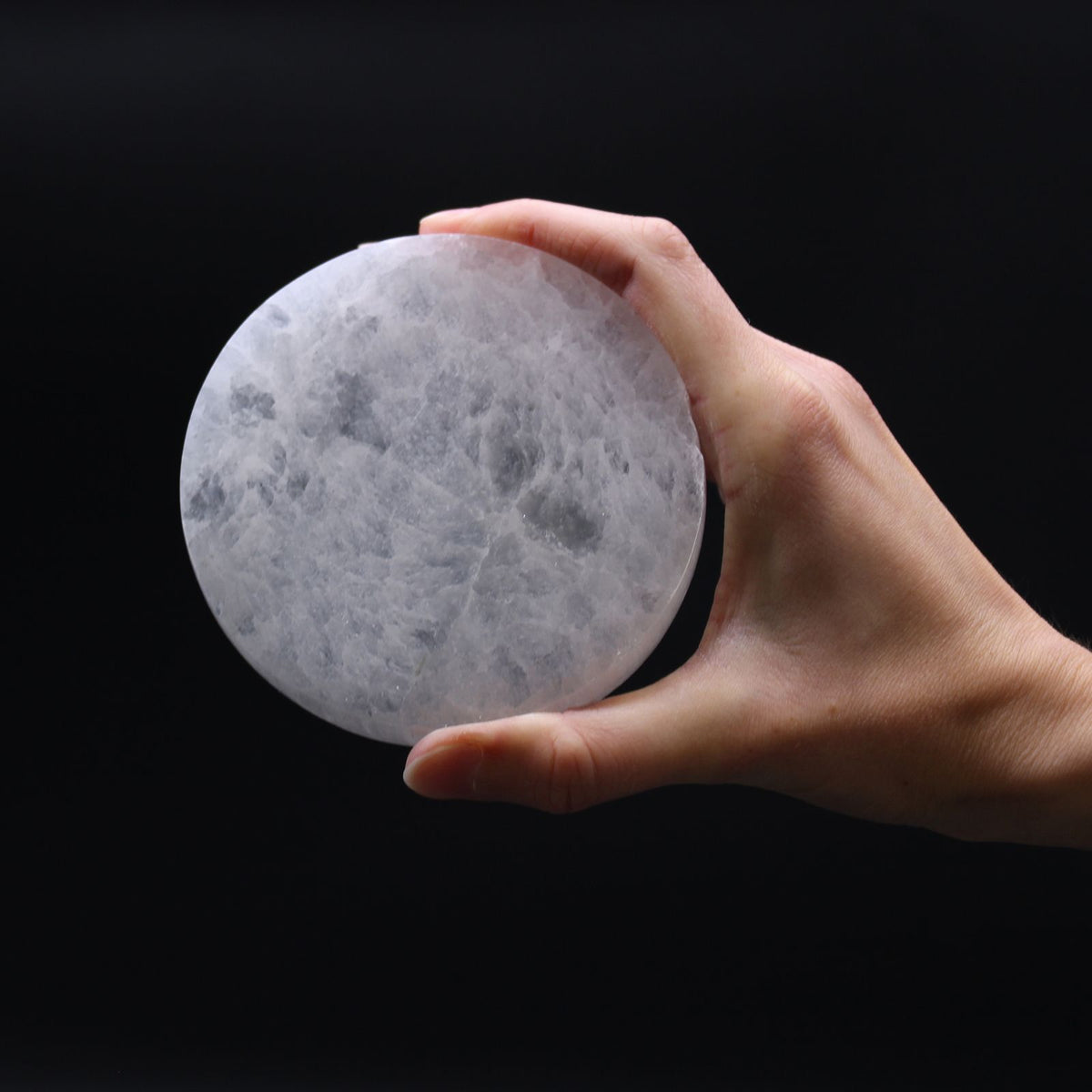 Plain medium round selenite charging plate cut from Moroccan selenite