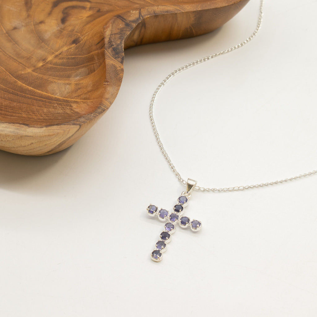 Silver-plated crucifix pendant set with deep purple stones, on linen - view 4