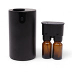 Double waterless essential oil nebuliser in dark wood finish with two oil bottles