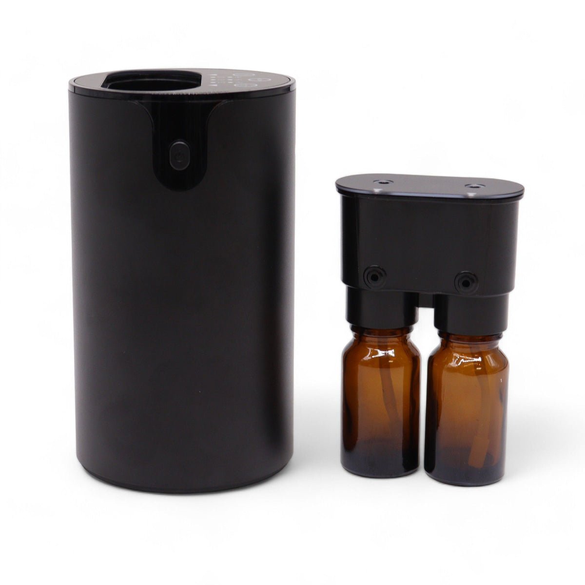 Double waterless essential oil nebuliser in dark wood finish with two oil bottles