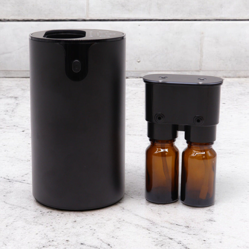Double waterless essential oil nebuliser in dark wood finish with two oil bottles - view 2