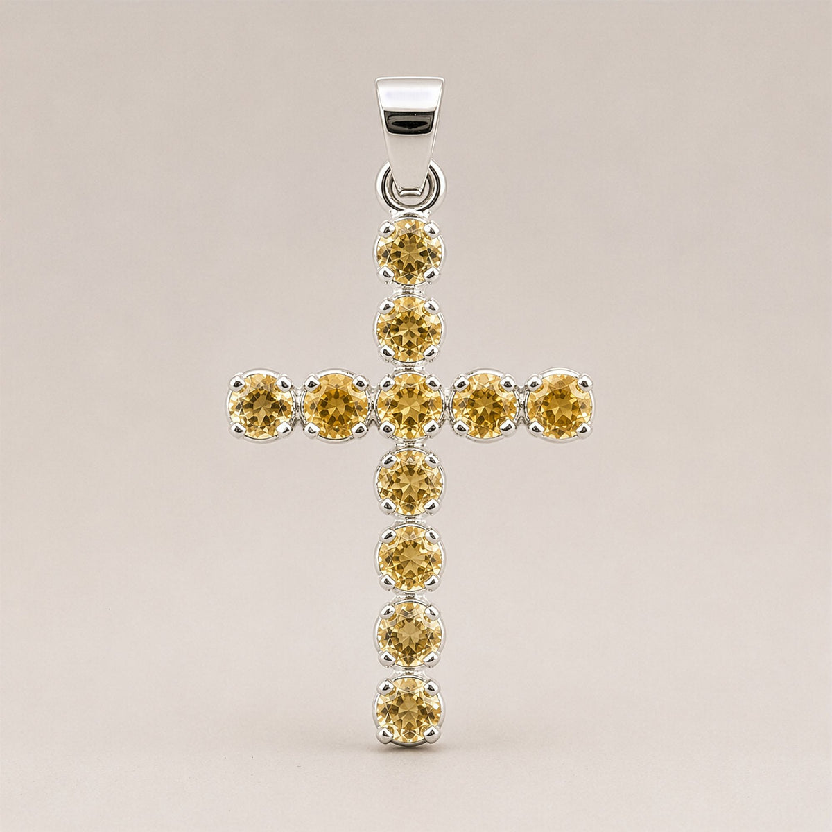 Silver-plated crucifix pendant set with golden citrine-coloured stones, on linen - view 8