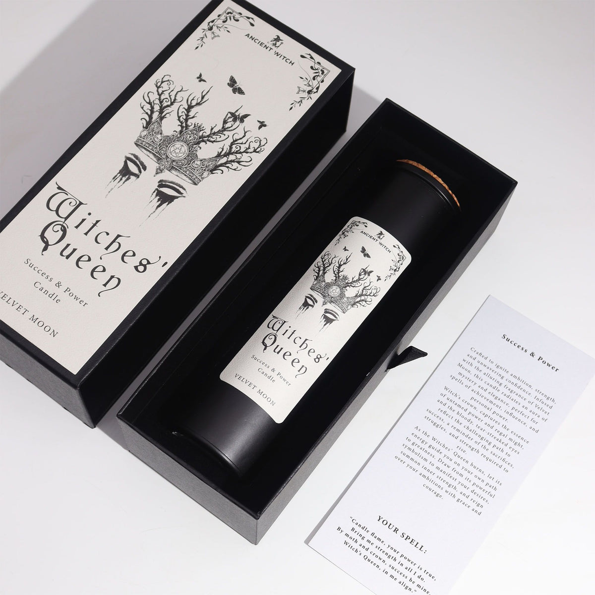 Black Witches' Queen candle tube beside its illustrated box, on cotton canvas - view 5