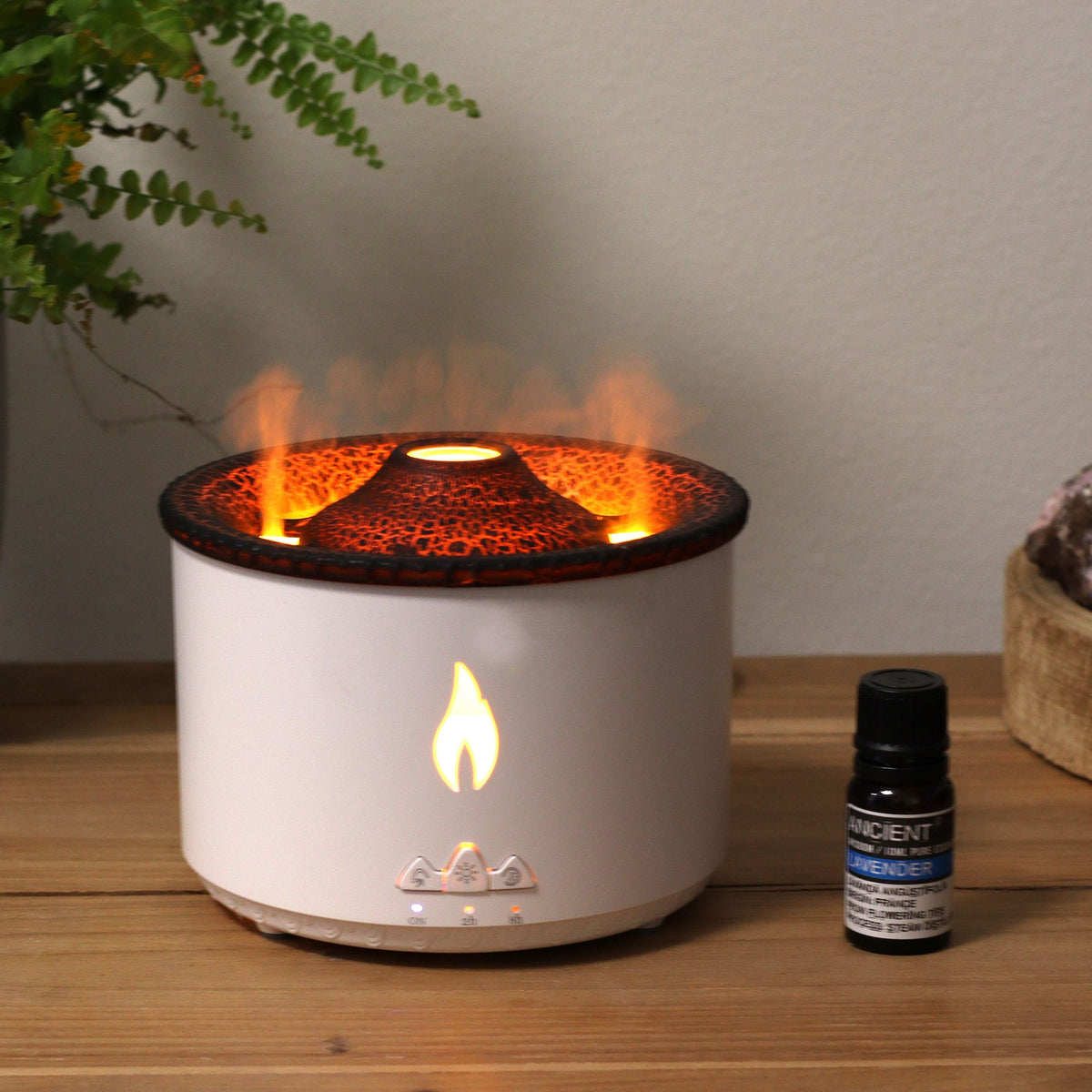White volcano flame aroma diffuser with a textured dark lid, on cotton canvas - view 4