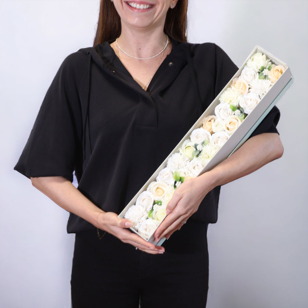 Long box of white and ivory soap roses lying open on cotton canvas - view 6