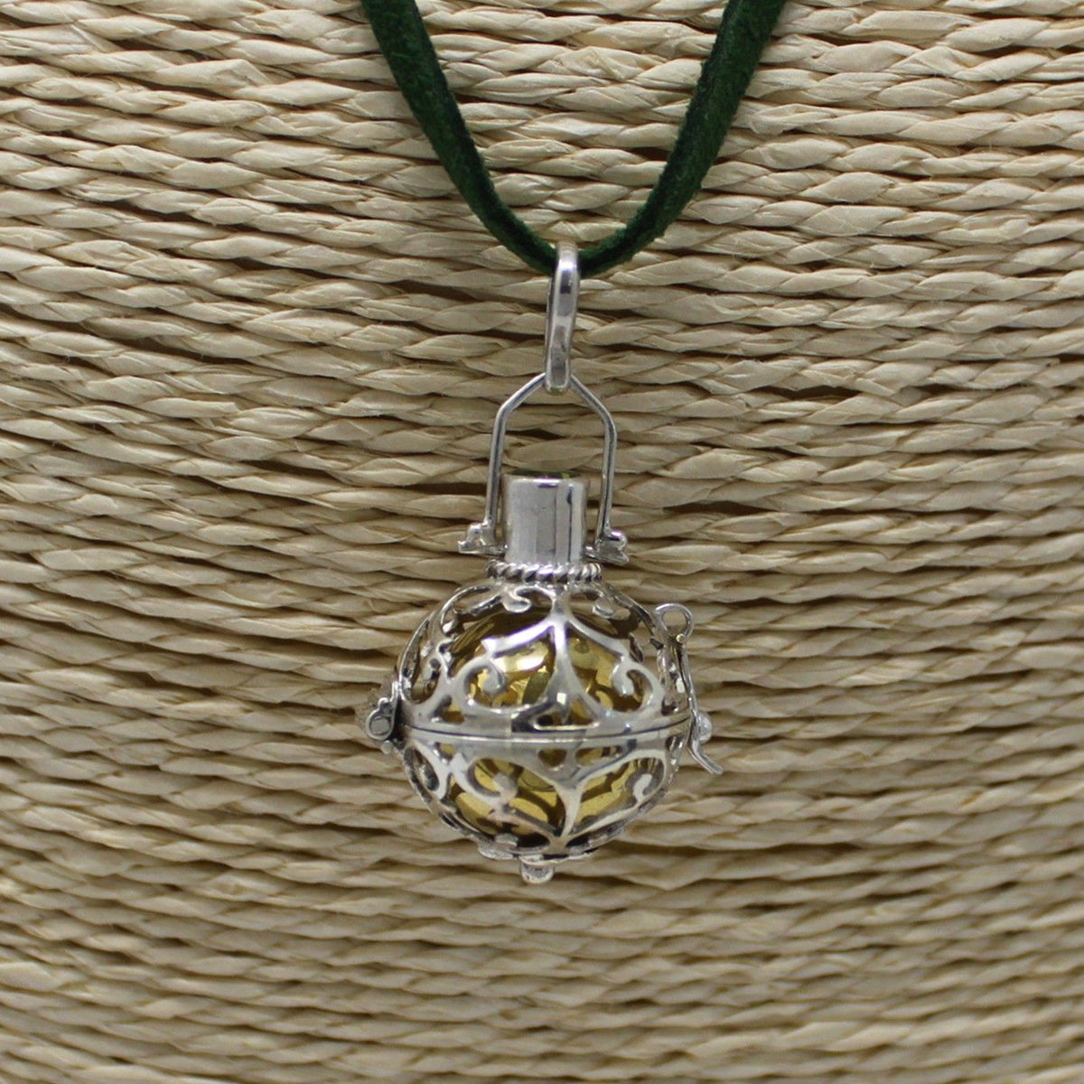 Silver angel bell pendant in the Romance design on a neck cord - view 2