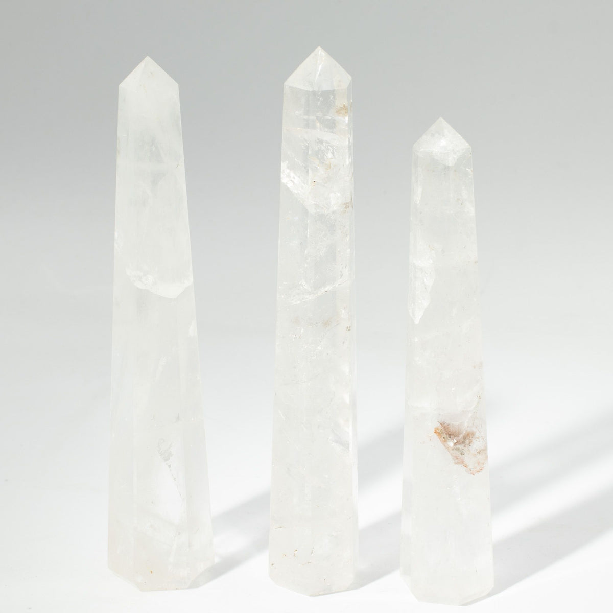 Tall six-sided clear quartz obelisk point - view 7