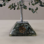 Moss agate chipstone tree on a speckled orgonite base, on rumpled linen - view 3