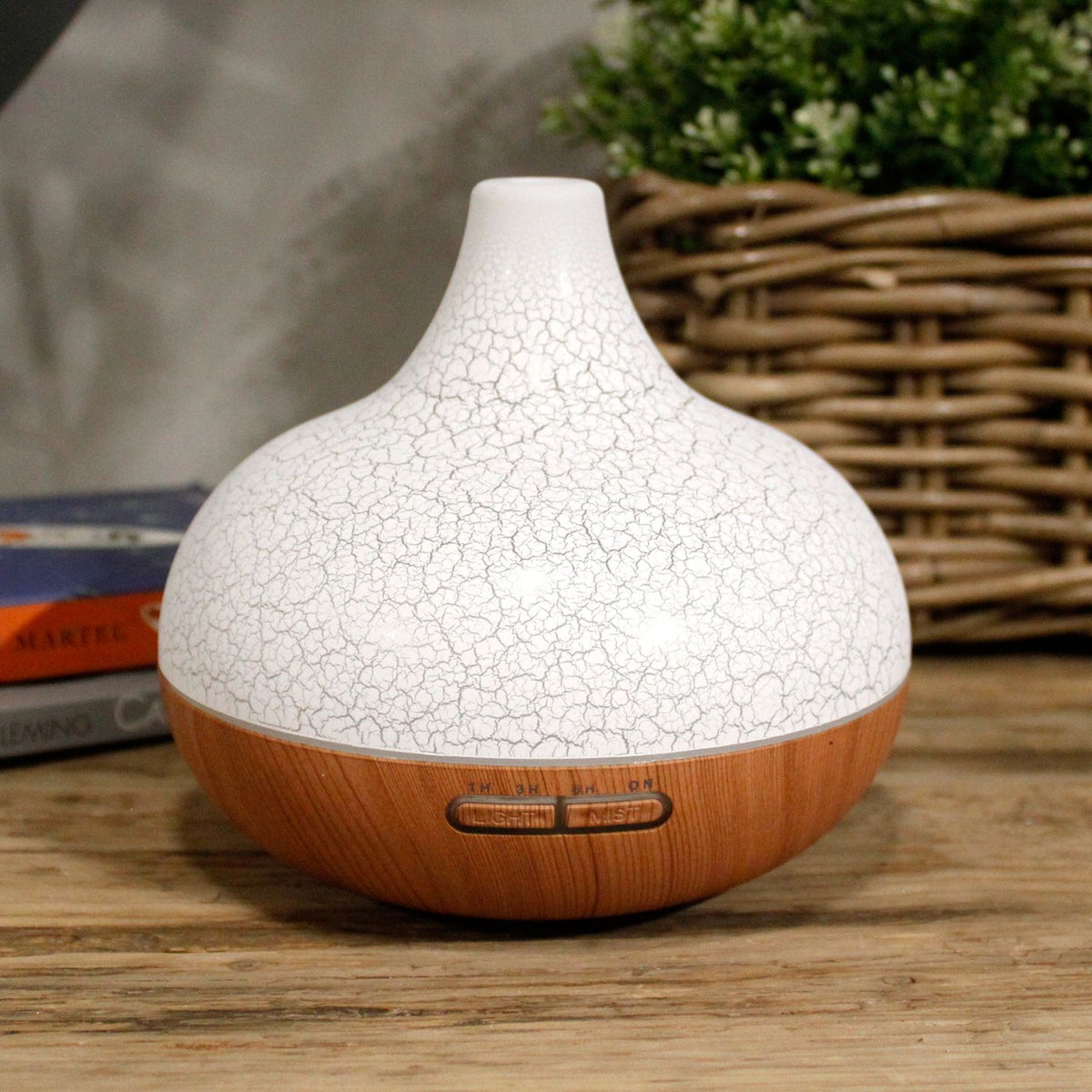 Shell shaped Santorini USB aroma diffuser releasing a cool mist - view 2