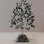 Moss agate chipstone tree on a speckled orgonite base, on rumpled linen - view 4