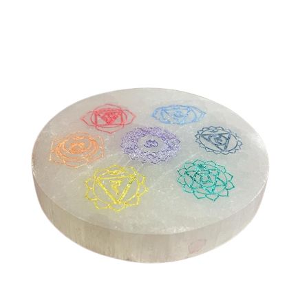 Small round selenite charging plate with the seven chakra symbols in colour - view 3
