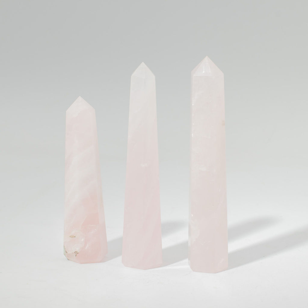 Polished rose quartz obelisk point, a six faced pale pink crystal tower - view 4