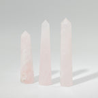Polished rose quartz obelisk point, a six faced pale pink crystal tower - view 4